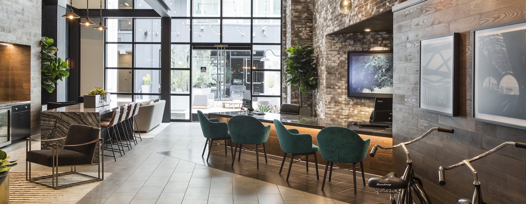 a clubroom with tables and chairs